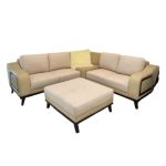 A relaxed Era corner sofa set paired with a foot stool, ideal for lounging in a fashionable home environment.
