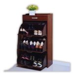 Wooden storage cabinet placed under staircase, decorated with flower vase, digital clock, and fine wines box in a modern home interior.